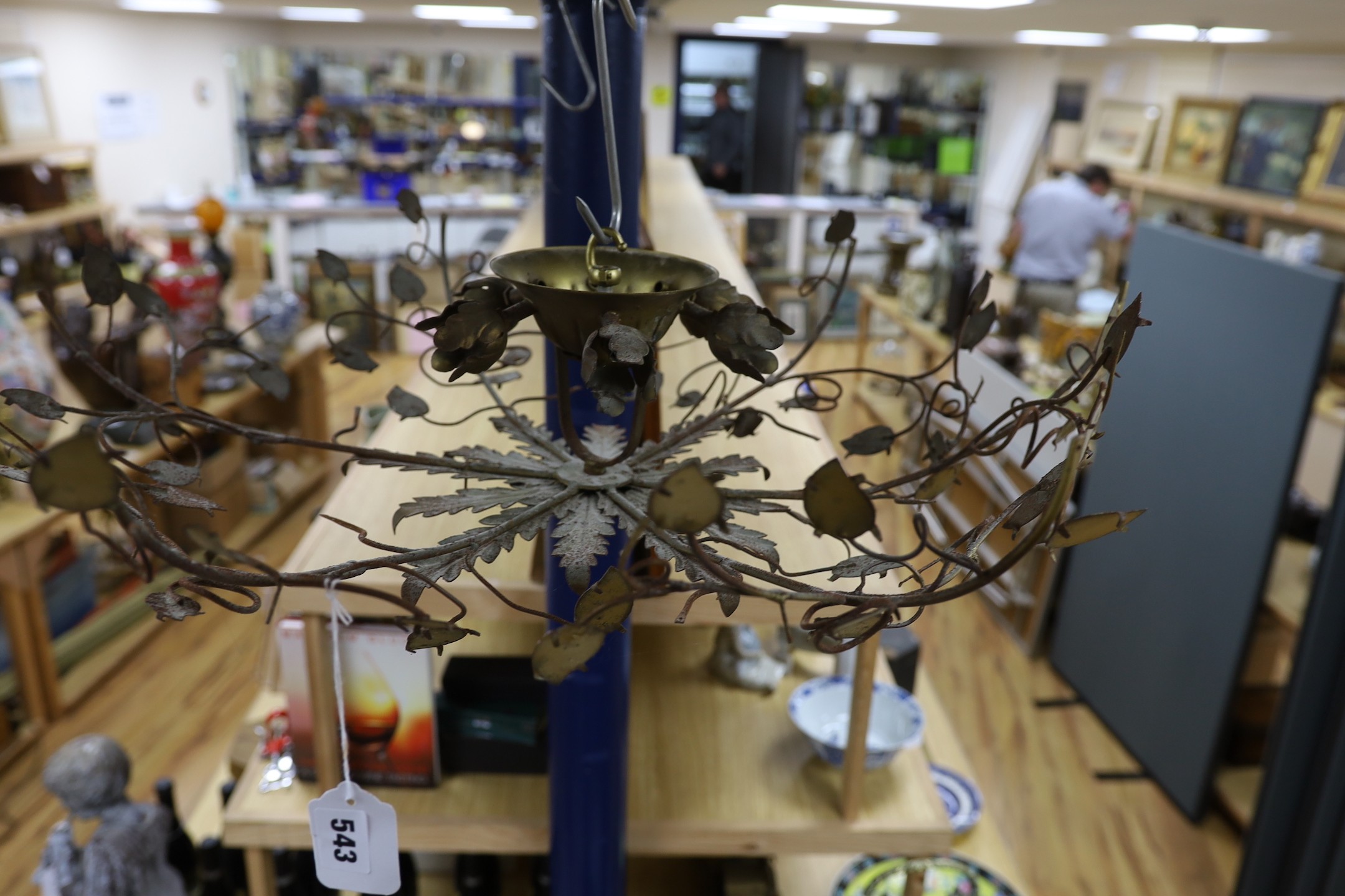 An Italian gilt metal ceiling light with leaf decoration